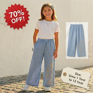 May include: A young person wearing light blue wide-leg pants with gold floral embroidery, paired with a white t-shirt. A red starburst graphic displays "70% OFF!". The pants are also shown in a separate image. Size: 1 Year to 13 Year.