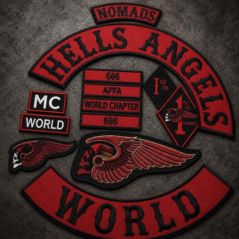 May include: A collection of embroidered patches featuring red and black color schemes. The set includes a large arched Hells Angels patch, a Nomads rocker, a World rocker, rectangular patches with 666, AFFA, and World Chapter text, and winged skull emblems.