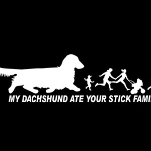 May include: A white silhouette of a dachshund dog with the text "My dachshund ate your stick family" below it. The dog is shown as larger than a family of stick figures walking behind it.