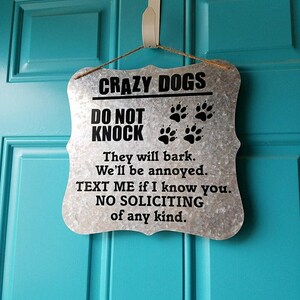crazy dogs, crazy dogs live here, crazy dogs sign, do not knock, no soliciting, no soliciting sign, do not knock sign, don't knock