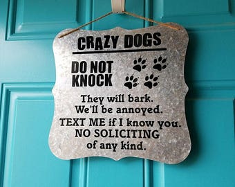 crazy dogs, crazy dogs live here, crazy dogs sign, do not knock, no soliciting, no soliciting sign, do not knock sign, don't knock