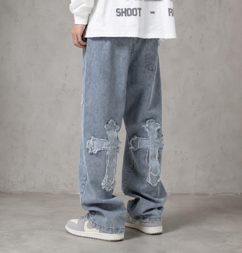 y2k jeans, baggy denim, cross jeans, streetwear pants, oversized jeans, grunge clothing, skater jeans, vintage denim, gothic jeans, wide leg jeans, unisex clothing, hip hop fashion, patchwork jeans