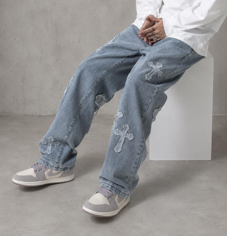 y2k jeans, baggy denim, cross jeans, streetwear pants, oversized jeans, grunge clothing, skater jeans, vintage denim, gothic jeans, wide leg jeans, unisex clothing, hip hop fashion, patchwork jeans