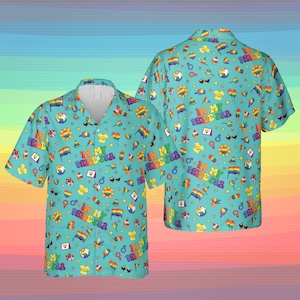 May include: Two short-sleeved button-down shirts with a turquoise background. The shirts are covered in colorful Pride-themed graphics, including rainbows, flags, and the text "IN MY PRIDE ERA". The shirts are displayed against a rainbow gradient background.