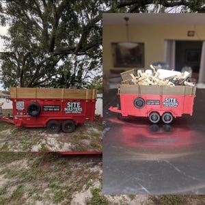 May include: A red dump trailer with wooden side panels and black wheels, featuring the text SITE MASTERS JUNK REMOVAL and a QR code on the side. The image shows both a full-sized trailer outdoors and a miniature scale model of the same trailer.