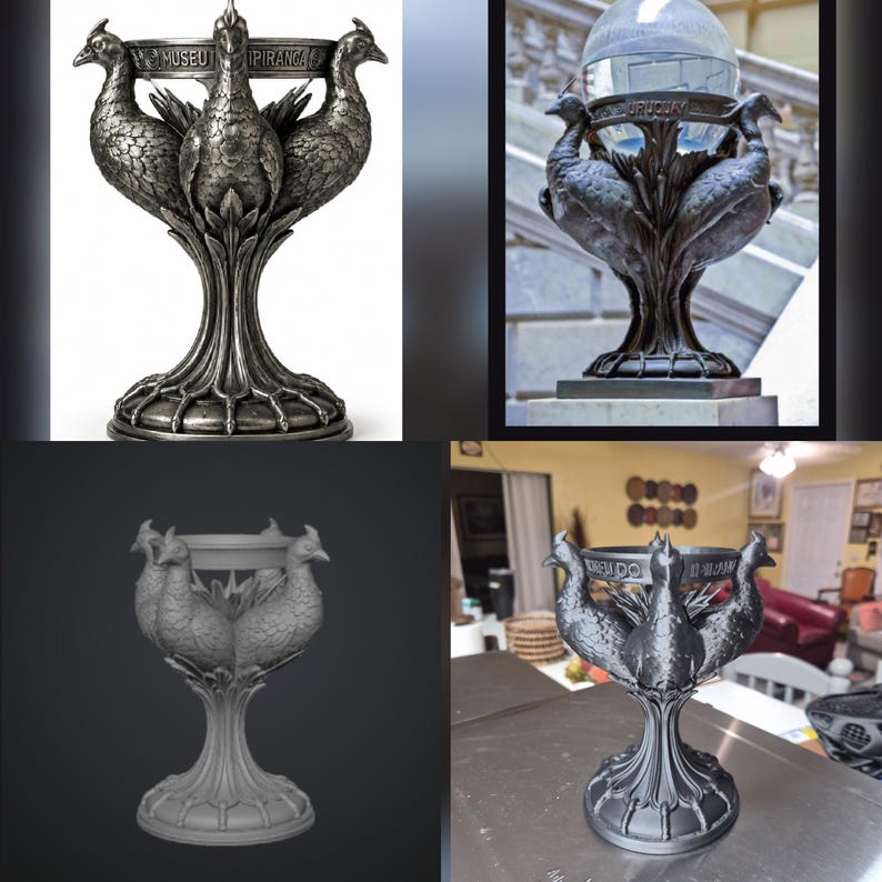 May include: A metallic silver-toned decorative stand featuring three sculpted birds arranged in a circle around a central column. The upper rim displays the text MUSEU DO IPIRANGA. The base is circular with claw-like feet extending outward.