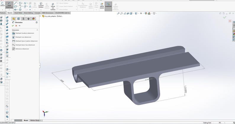 May include: A 3D computer-aided design model of a grey mechanical component featuring a flat rectangular top plate integrated with a central hollow square-shaped base. The digital rendering displays technical dimension lines and numerical annotations.
