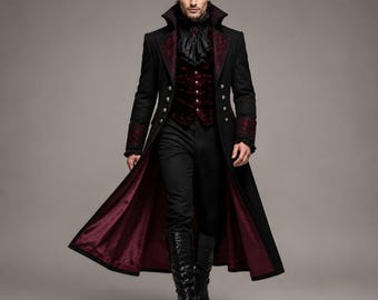 May include: A long black coat with a high collar, featuring deep red patterned lapels and cuffs, worn over a dark red velvet vest with silver buttons, a black ruffled cravat, black trousers, and black knee-high boots with a structured silhouette.