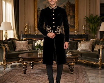 May include: A black velvet coat with gold embroidery and gold buttons. The coat has a mandarin collar and is worn with black pants and black dress shoes. The coat is a formal style, suitable for special occasions.