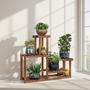 May include: A multi-tiered, wooden plant stand with various potted plants. The stand is made of dark brown wood and has a stepped design. The plants include succulents and leafy green plants in decorative pots. The background is a neutral wall with sunlight.
