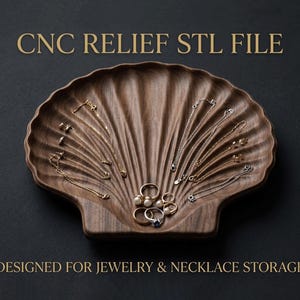 May include: A dark brown wooden tray shaped like a seashell, featuring a ribbed surface texture. The tray holds various gold and silver necklaces, bracelets, and rings. Text at the top reads CNC RELIEF STL FILE and at the bottom DESIGNED FOR JEWELRY & NECKLACE STORAGE.