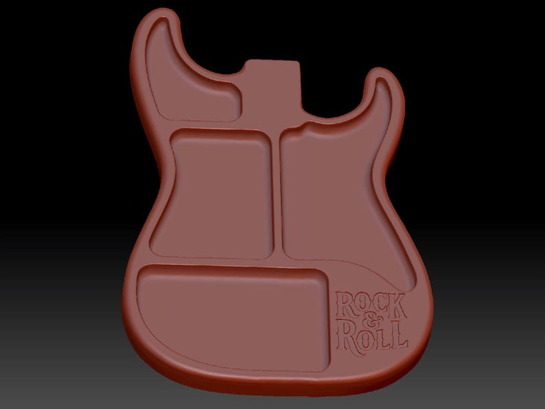 May include: A brown guitar-shaped tray with three distinct recessed compartments. The tray features a smooth, rounded edge and the text "ROCK & ROLL" is embossed in the lower right section, providing a clear visual representation of the design.