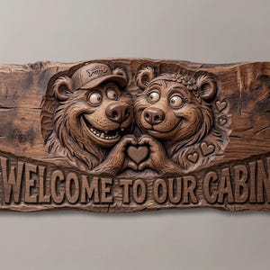 3D relief wood carving of two adorable cartoon bears, a male with a fishing hat and female with a flower wreath, holding paws to create a heart shape. The rustic wooden sign reads "WELCOME TO OUR CABIN". Ideal for woodland cabin decor, campsite entryways, or a unique woodworking gift. High-quality STL model tailored for CNC router, laser engraver, and 3D printer projects.