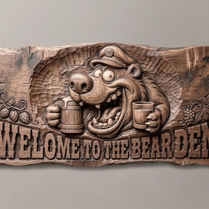 May include: A rectangular wooden wall sign featuring a relief carving of a cartoon bear wearing a cap, holding a beer mug and a glass. The text WELCOME TO THE BEAR DEN is carved at the bottom. Hops and grapes are carved on the left and right sides.