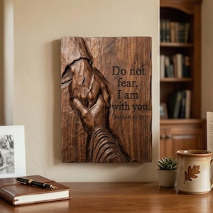 Digital STL file preview of a 3D wood-style relief: Jesus' scarred hand holds a seeking hand beside the verse Do not fear, I am with you, Isaiah 41:10. Christian faith wall art for CNC router files, 3D print model, laser engraving, prayer room decor, church decor, religious decor, baptism or recovery gift.