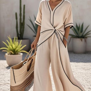 Vestido largo de mezcla de lino, escote en V, estilo holgado y fluido, ideal para la playa o como prenda de resort.