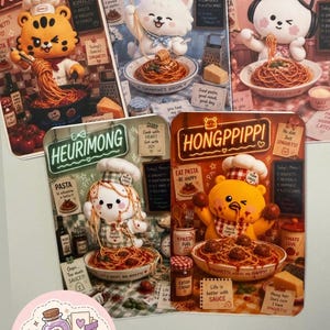 May include: Five rectangular metal signs featuring cartoon animal chefs preparing spaghetti. Each sign displays a unique character name like Kimachi, Zuharong, Sakkukku, Heurimong, or Hongppippi, alongside kitchen items, text, and illustrations of pasta dishes.