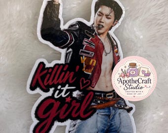 May include: A die-cut sticker featuring a person with dark hair wearing an open red and black leather jacket, a silver chain, and blue jeans. The text "Killin' it girl" is printed in bold red and black script next to the figure, with a small heart.