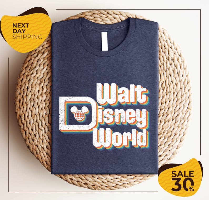 A navy blue t-shirt with the text "Walt Disney World" printed on it, along with a Mickey Mouse logo, is displayed on a woven basket. The image also includes text indicating a sale with a 30% discount.