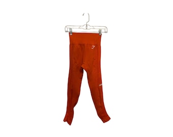 Naadloze, onberispelijke gebreide Gymshark-legging Burnt Orange XS Pilates Cardio Gymcore