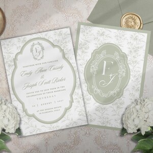 May include: Two rectangular wedding invitation cards featuring a sage green and white floral toile pattern. The left card displays text including Emily Anne Cassidy and Joseph Scott Ricker. The right card features a central oval monogram with the letters EJ.