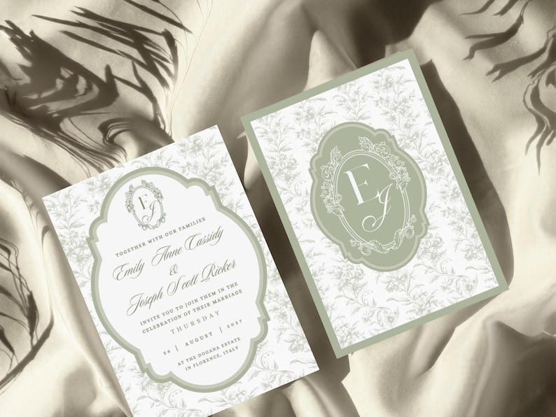 May include: Two rectangular wedding invitation cards featuring a sage green border and a white background with a delicate gray floral pattern. The cards display a central sage green ornate frame containing the initials EJ and wedding details.