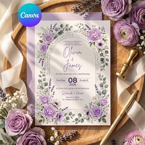 May include: A wedding invitation card featuring a purple floral arch design with lavender and roses. The text reads: Olivia & James, Sunday 08 August 2026, at four o'clock in the afternoon, Lakeside Manor. The card is surrounded by fresh purple roses.