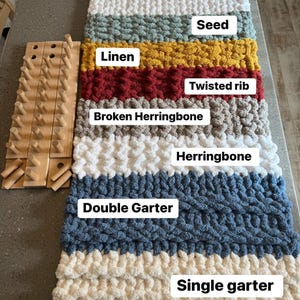 May include: A sample of various knitted textures and patterns, including "Basic w/ hearts", "Seed", "Linen", "Twisted rib", "Broken Herringbone", "Herringbone", "Double Garter", and "Single garter". The sample is in various colors, including white, blue, yellow, and red. A wooden pegboard is on the left.
