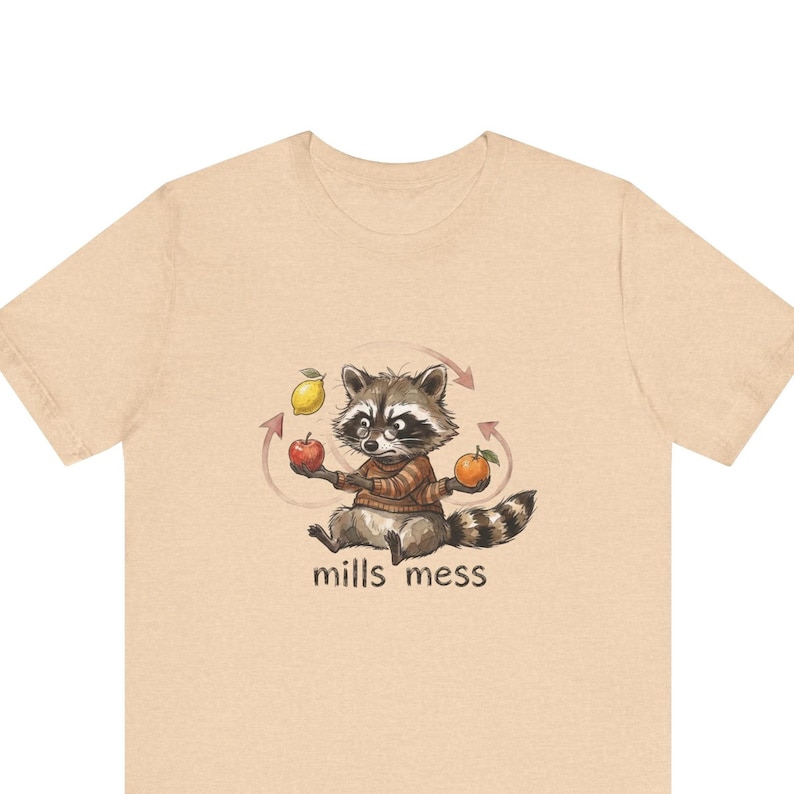 Mills Mess Raccoon Juggler Graphic Tee - Funny Juggling Animal Gift Bild 1
