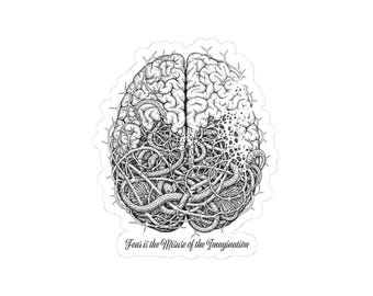 May include: A black and white sticker featuring a detailed illustration of a human brain entangled in thorny vines and snakes. The right side of the brain appears to be dissolving into dots. Below the brain, the text reads: Fear is the Misuse of the Imagination.
