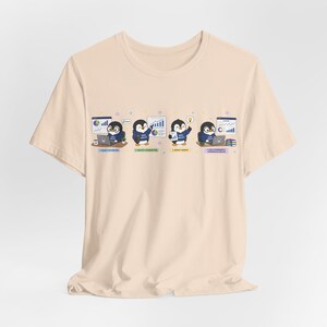May include: Beige t-shirt featuring a graphic of four penguins in a data analysis theme. Each penguin is depicted with a laptop or chart, with text below each image: "1. Prepare the data", "2. Analyze & Visualize Data", "3. Identify Insights", and "4. Build dashboards & communicate results."