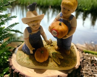 Denim Days by Homco  Danny & Debbie  # 1531 “The Prize Pump " 1997 Figurine #13