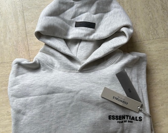 Felpa con cappuccio Fear of God Essentials, grigio chiaro mélange, nuova