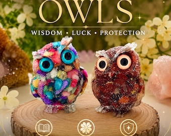 May include: Two owl figurines on a wooden slice. The left owl is multicolored with bright blue eyes. The right owl is dark red with light-colored eyes. Text reads: NATURAL CRYSTAL OWLS, WISDOM, LUCK, PROTECTION, WISDOM, LUCK, PROTECTION.
