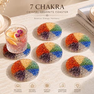 May include: Five circular 7 Chakra crystal orgonite coasters featuring a segmented design with red, orange, yellow, green, blue, indigo, and violet crushed stones. One coaster supports a glass of water with citrus slices and purple flowers.