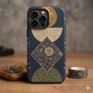 May include: A dark blue smartphone case featuring a central diamond-shaped panel with a detailed floral pattern in gold, orange, and green. The design includes geometric semicircles and circles in muted tones, accented with small stars and leaf motifs.