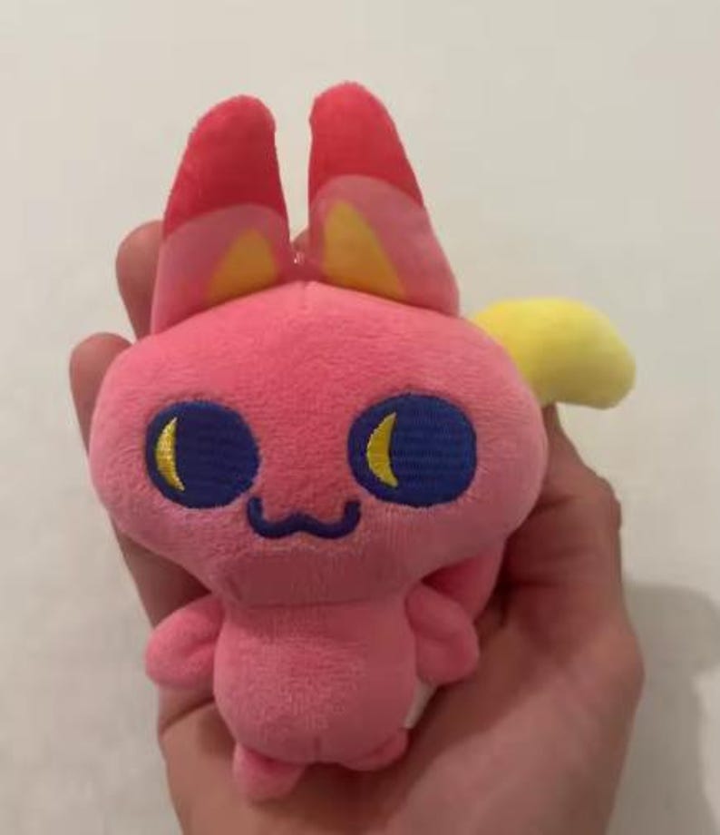 Rosa Tamagotchi Paradise plyschnyckelring | Bandai kaninfigur plysch | Kawaii samlarleksak virtuellt husdjur present 10 cm bild 2