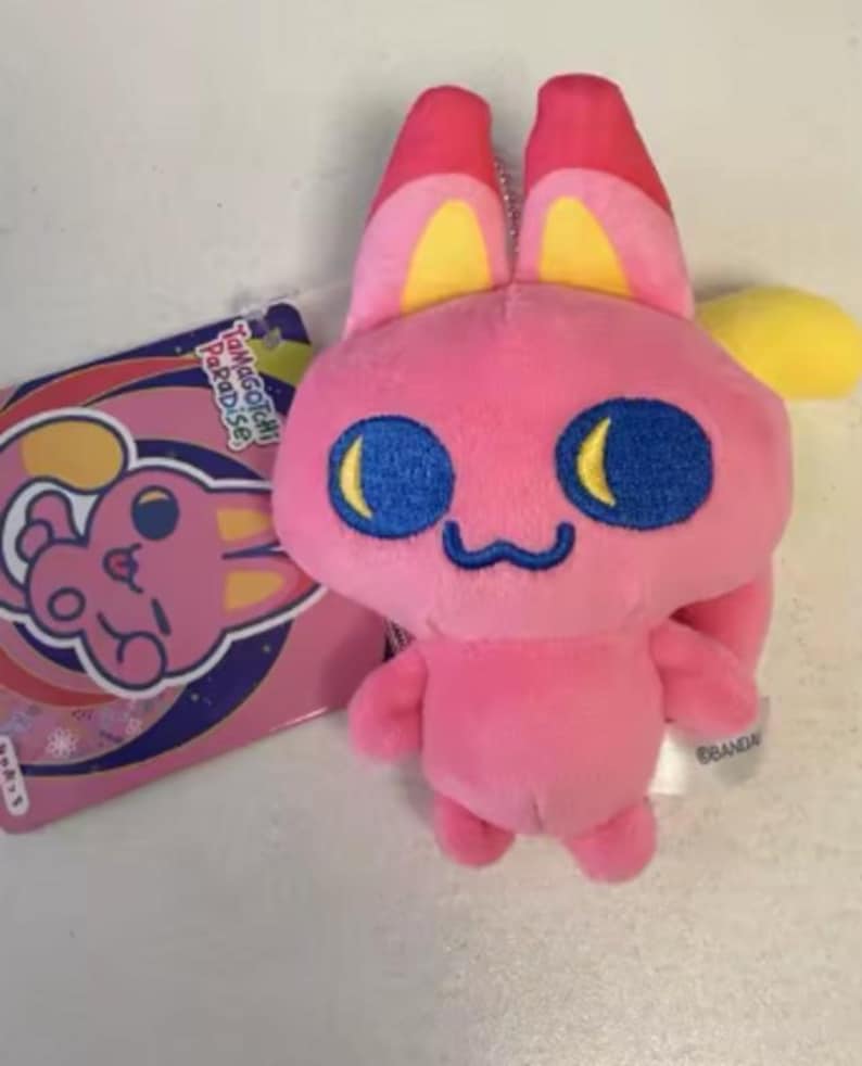 Rosa Tamagotchi Paradise plyschnyckelring | Bandai kaninfigur plysch | Kawaii samlarleksak virtuellt husdjur present 10 cm bild 1