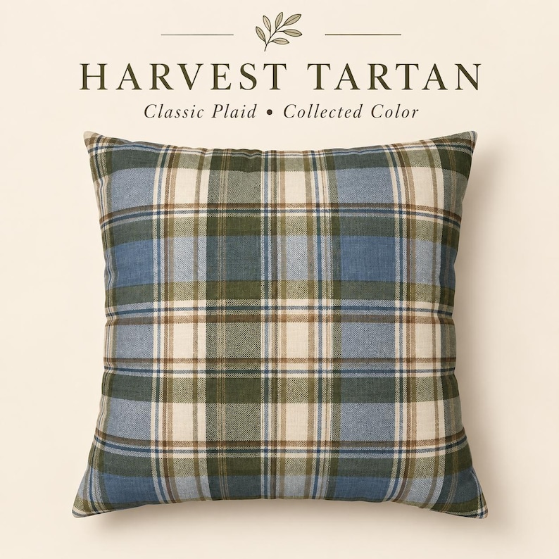 Blue and olive Harvest Tartan pillow cover featuring a classic plaid pattern in dusty blue, olive green, cream and warm brown on a neutral background.