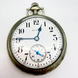 1927 Elgin-zakhorloge, maat 16s, klasse 480 7J zilverkleur rood, minutenlooptijd