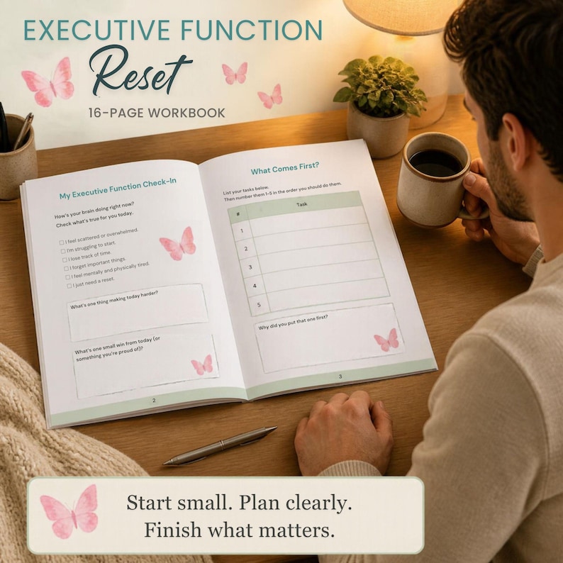 May include: An open 16-page workbook titled Executive Function Reset featuring pink butterfly illustrations. The pages include a My Executive Function Check-In and a What Comes First task list. A pen rests on the desk near the workbook.