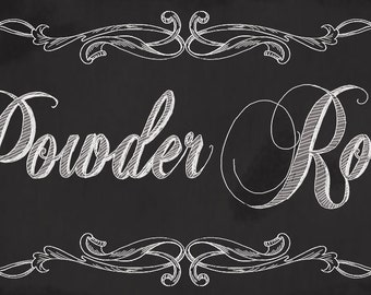 May include: A black chalkboard sign with white chalk lettering that reads "Powder Room". The sign is decorated with ornate white chalk flourishes.