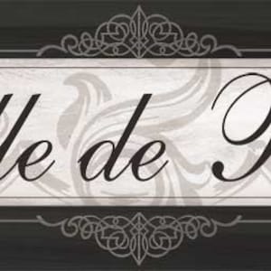 May include: Black and white sign with ornate scrollwork border. The sign reads "Salle de Bain" in a decorative script font.