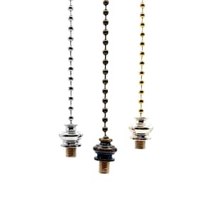 May include: Three decorative light pull chains with different finishes: silver, bronze, and gold. Each chain has a round, decorative end cap.