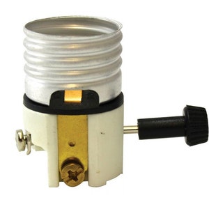 May include: A white ceramic light bulb socket with a black on/off switch and a silver metal threaded shell.