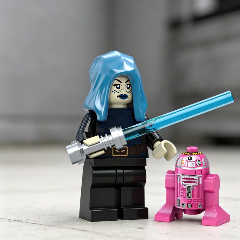 May include: A plastic minifigure with a blue hood, dark blue torso, and black legs, holding a translucent blue lightsaber. Beside the minifigure stands a small, pink, cylindrical droid with white and black printed details on its front panel.