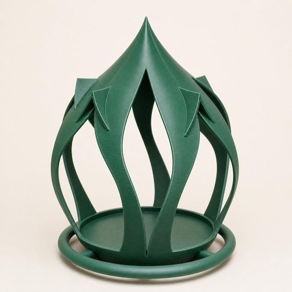 Profile view of the pointed Leafspire Haven bird feeder silhouette