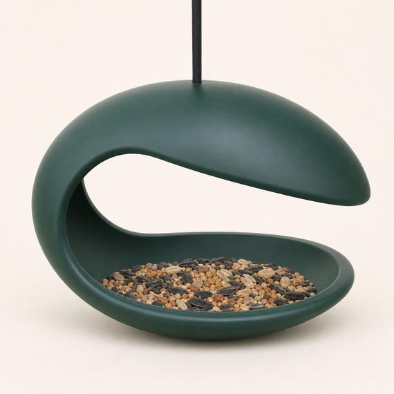 Front view of the Forest Green Mooncurve Haven feeder and covered seed bowl