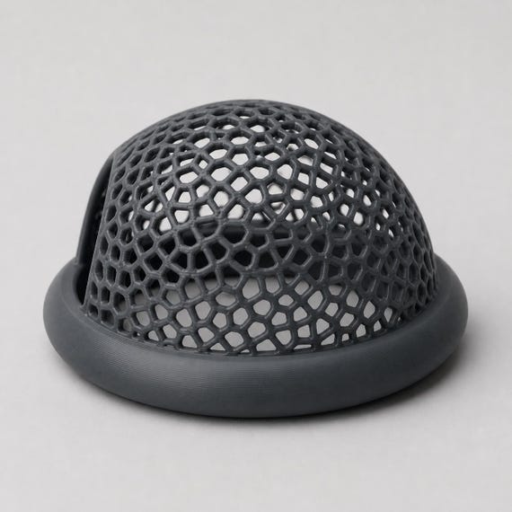 Dark gray floating fish hide on a light gray background, shown from the rear to display the rounded open cellular dome and smooth ring.