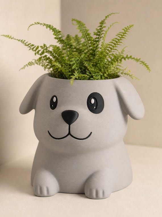 Low three-quarter close-up of the Slate Coat dog planter with the Wide-Eyed Patch expression